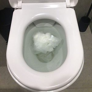toilet-blocked-with-paper